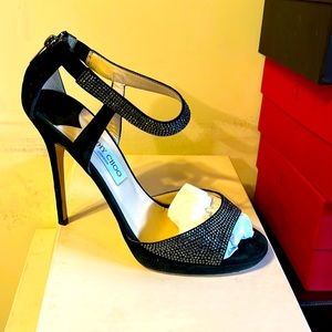 Used once suede with crystals skuff on left heel